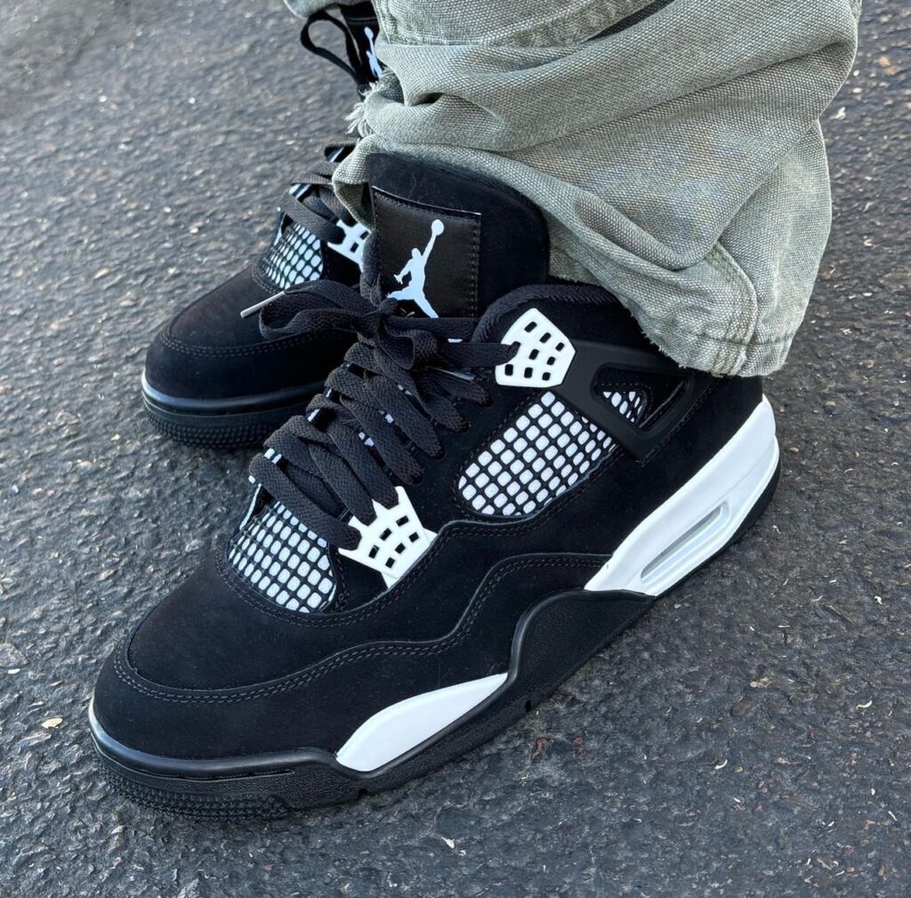 Air Jordan 4 Retro ‘White Thunder’ Review: Classic Contrast with Monochrome Fire