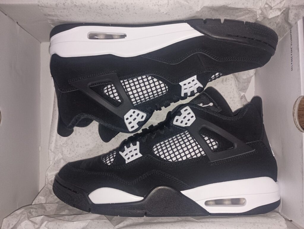 Air Jordan 4 Retro ‘White Thunder’ Review: Classic Contrast with Monochrome Fire