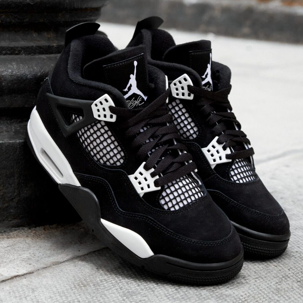 Air Jordan 4 Retro ‘White Thunder’ Review: Classic Contrast with Monochrome Fire