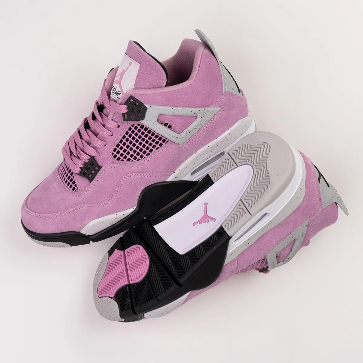 (WMNS) Air Jordan 4 Retro ‘Orchid’ Review: A Vibrant Feminine Statement in Sneaker Culture