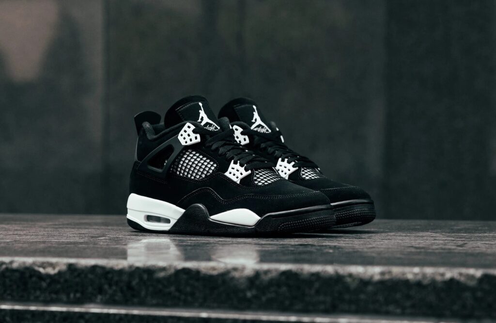 Air Jordan 4 Retro ‘White Thunder’ Review: Classic Contrast with Monochrome Fire